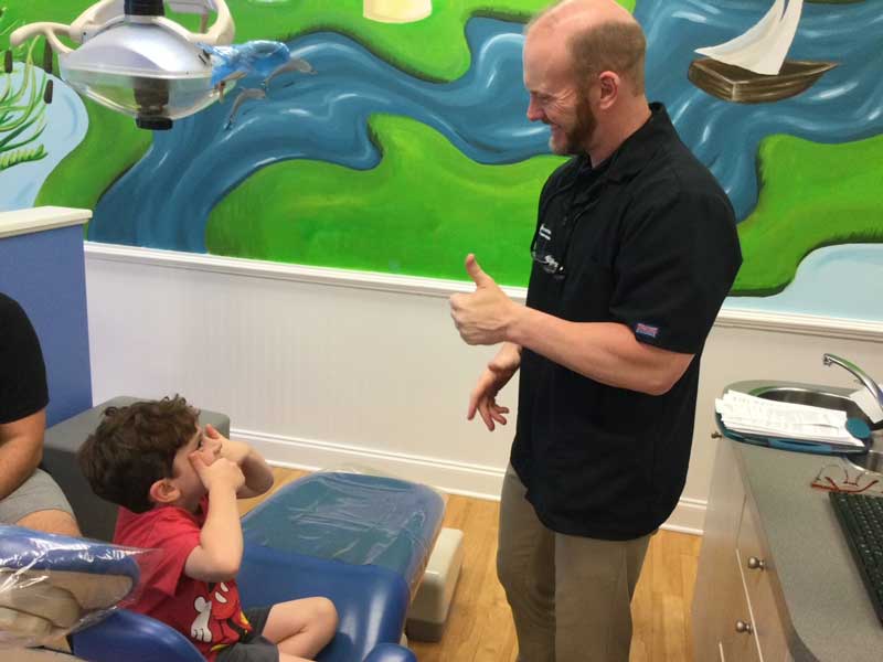 Dr. Paul of Cornerstone Children's Dentistry with a patient
